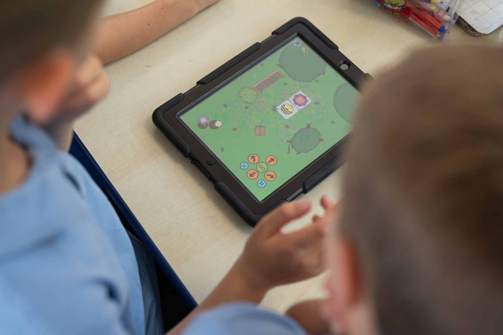 Computing Children using an iPad.